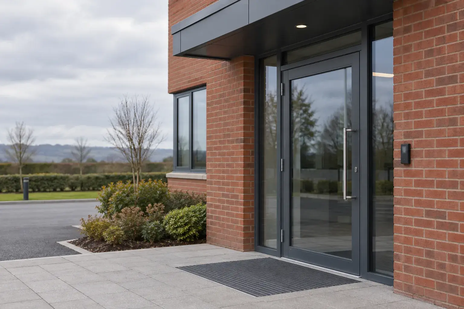 Access reader beside a commercial entrance