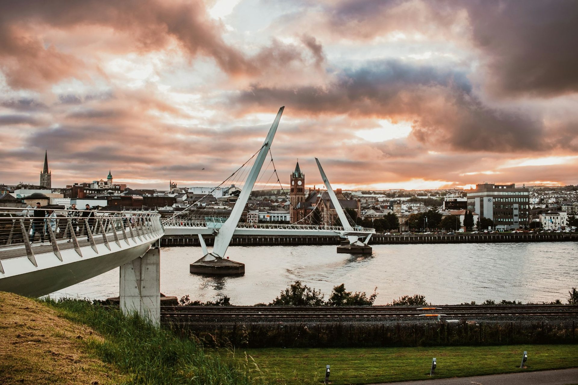 The Peace Bridge and Derry skyline at dusk