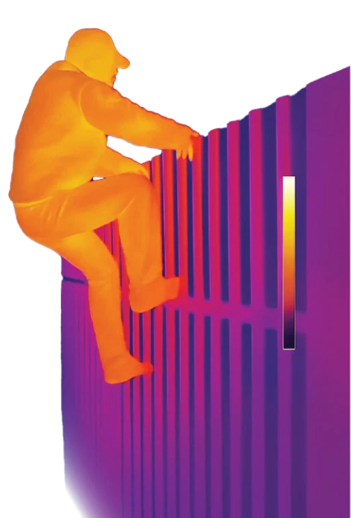 Thermal camera view of a person climbing a perimeter fence
